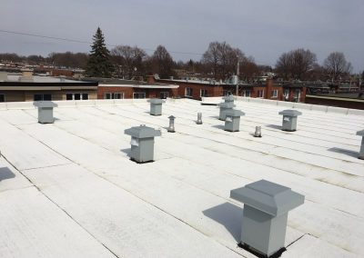 Pose membrane élastomère de toit plat à Mascouche - Toitures Duvernay à Laval