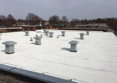 Pose membrane élastomère de toit plat à Repentigny - Toitures Duvernay à Laval