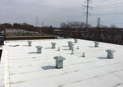 Pose membrane élastomère de toit plat à Westmount - Toitures Duvernay à Laval